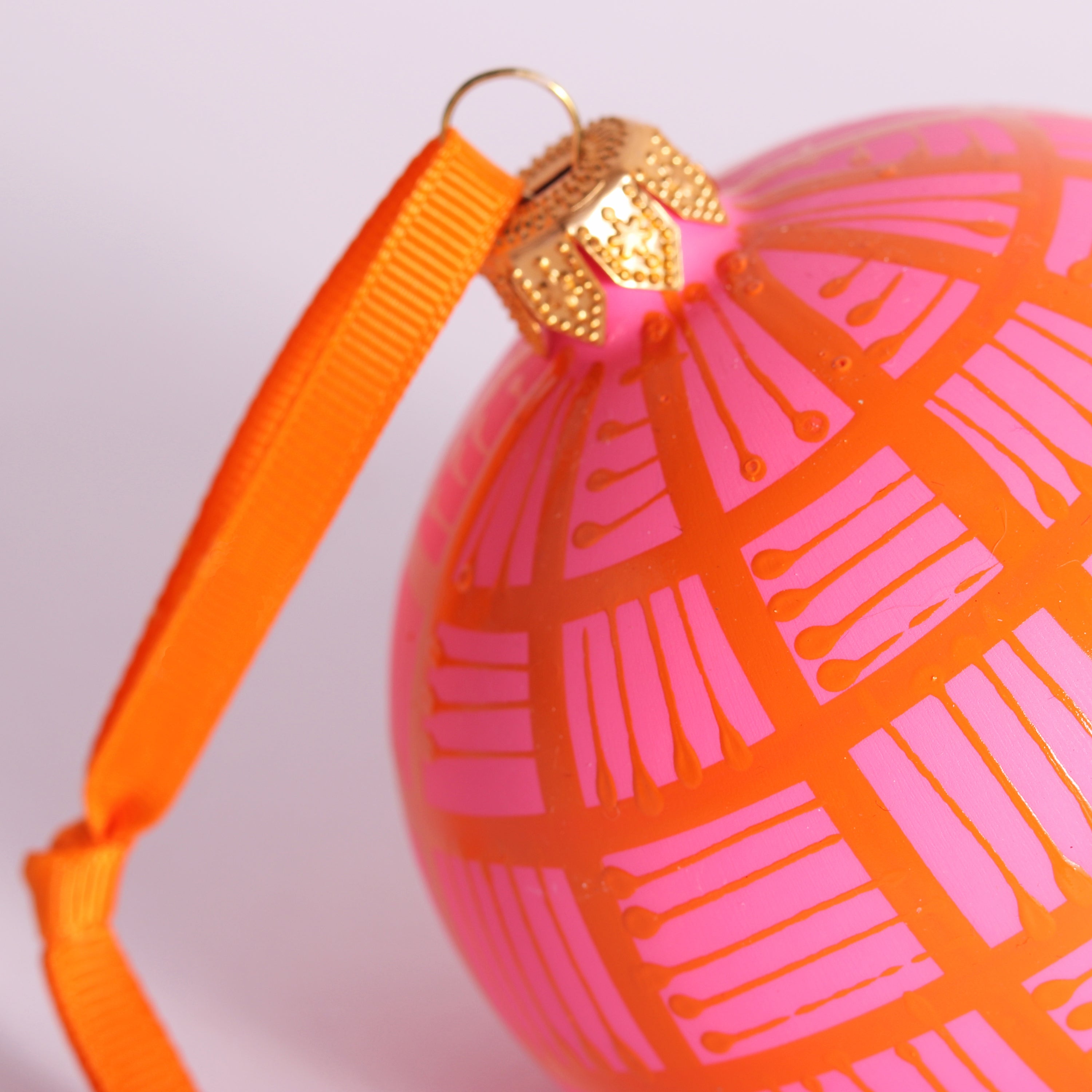 Lines Glass Bauble Orange on Pink, 8cm
